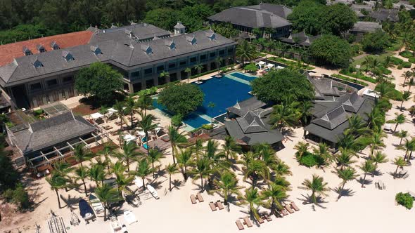 Aerial View of Beautiful Tropical Island with White Sand Beach Hotels and Tourists