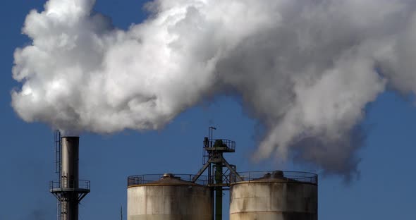 Smokestack of Sugar Refinery with Water Vapour, Near Caen in Normandy, Real Time 4K alt