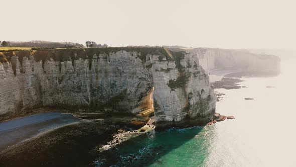 Drone Flying Left Near Epic Famous White Chalk Seaside Cliffs at Etretat Normandy Revealing Amazing alt