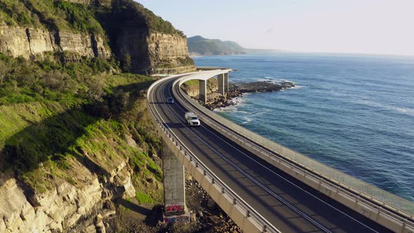 Driving Along The Sea Cliff Bridge   Aerial 