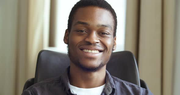 Front Closeup Portrait of Young Mixed Race Handsome African American Black Business Man Afro Student alt