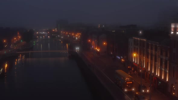 Aerial View of Illuminated Buildings on Liffey River Waterfront alt