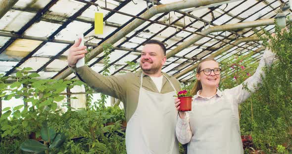 Young Couple During an Online Video Call  They Tell Their Friends About Their Small Business alt