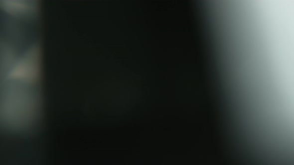 Super Slow Motion Shot of Diamond Light Reflection Isolated on Black Background at 1000Fps alt