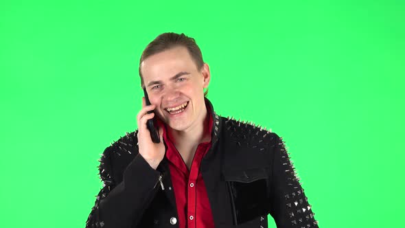 Guy Talking for Mobile Phone and Rejoice. Green Screen alt