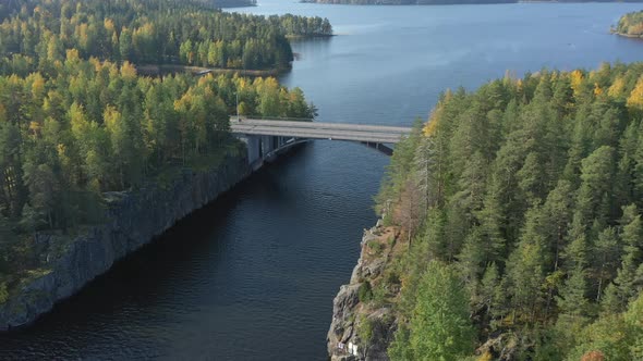A Bridge Across the Lake Saimaa with the Green Trees on the Side