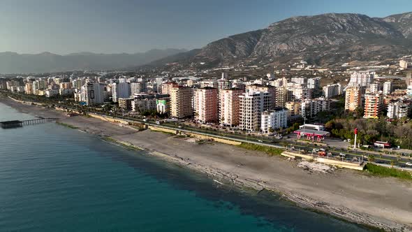 Reflection of the city in the sea aerial view 4 K alt