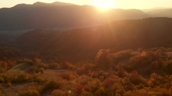 Aerial Slider Reveal Shot of Autumn Mountain Valley