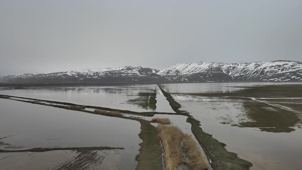 lake and snowy mountains alt