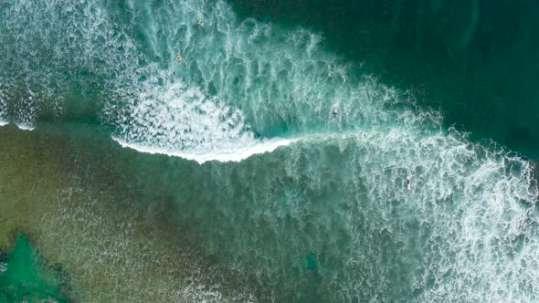 Surf Rolling Into Shore