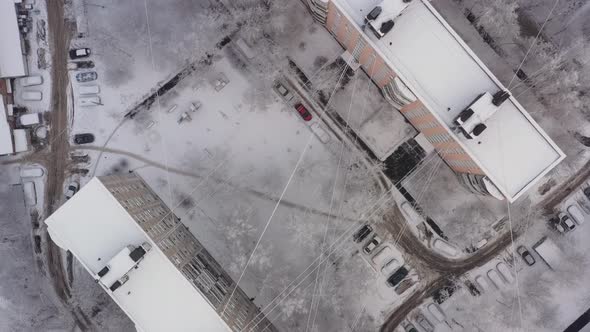 The Yard of the Apartment Building is Covered with Snow After the Snowfall