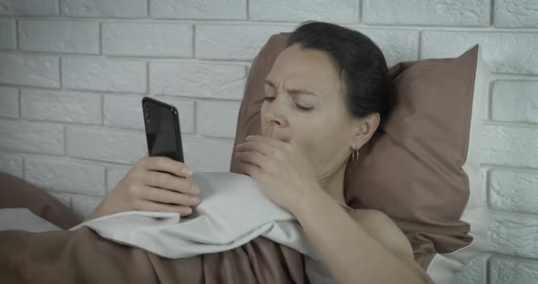 Lay with Telephone at Night alt