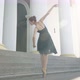 Back View of Slim Ballet Dancer on Tiptoes Dancing in Sunrays Outdoors - VideoHive Item for Sale