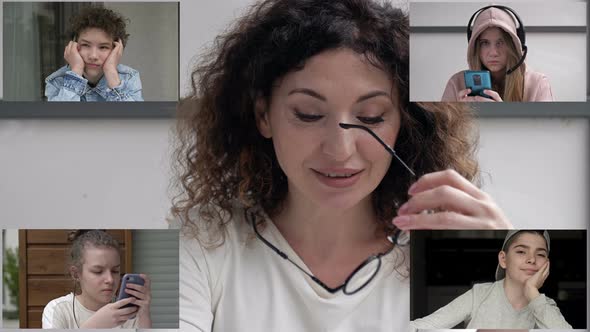 Teacher Conducts a Video Lesson for a Group of Students alt