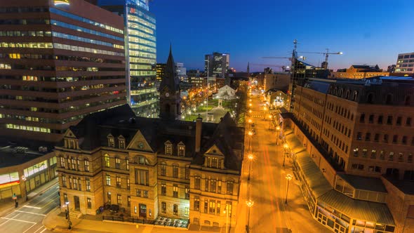 Twilight timelapse of Halifax Cityhall with the backdrop of business district alt