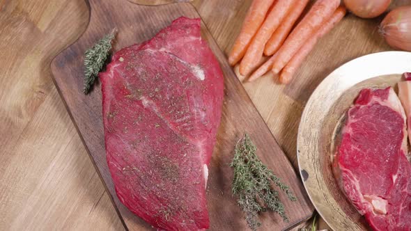 Panning From Left To Right Over Two Pieces of Grill Ready Meat alt