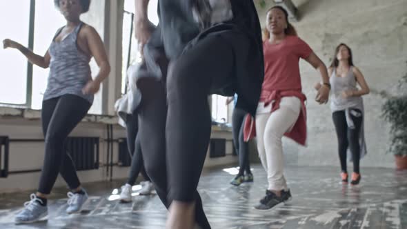 Dance Teacher and Women Rehearsing alt