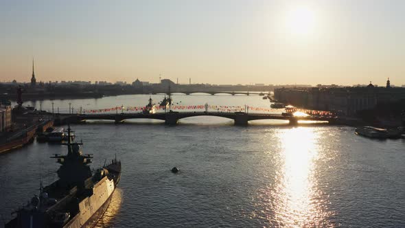 Aerial Morning Urban Landscape with Warships in the Waters of the Neva River Before the Holiday of alt