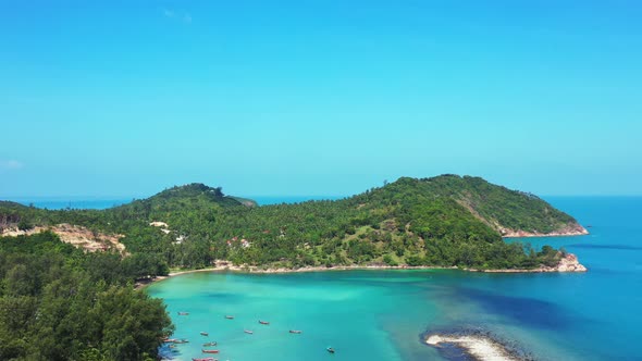Luxury above abstract view of a white sandy paradise beach and aqua blue ocean background alt