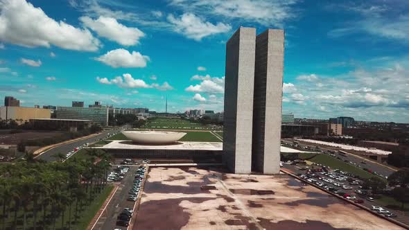 Beautiful aerial view rising upwards next to the National Congress buildings in Brasilia alt