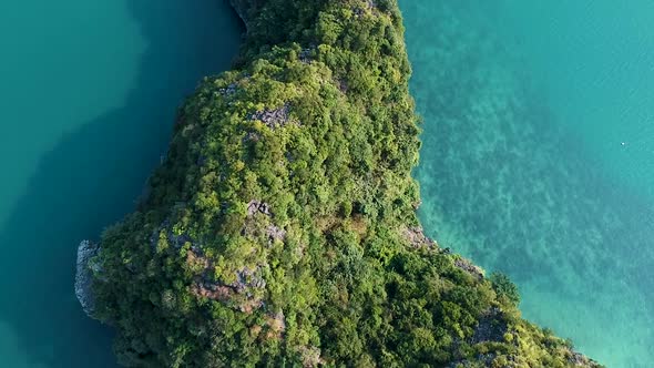Aerial drone shot over Ha Long Bay, blue sea and limestone islands of Lan ha bay. Vietnam alt