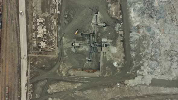 Aerial View of Opencast Mining Quarry with Lots of Machinery at Work - View From Above. Slag Pit alt
