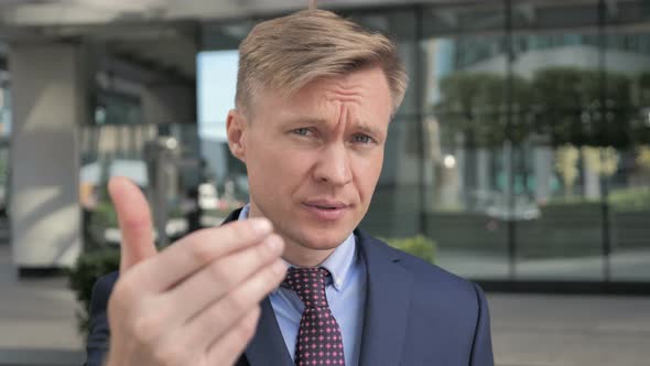 Inviting Gesture by Businessman alt