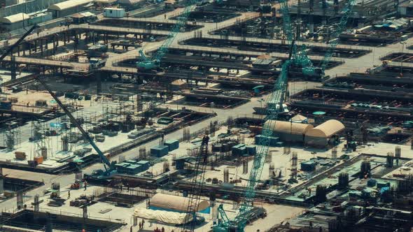 Time Lapse of Construction Site with Heavy Construction Machinery in Metropolis alt