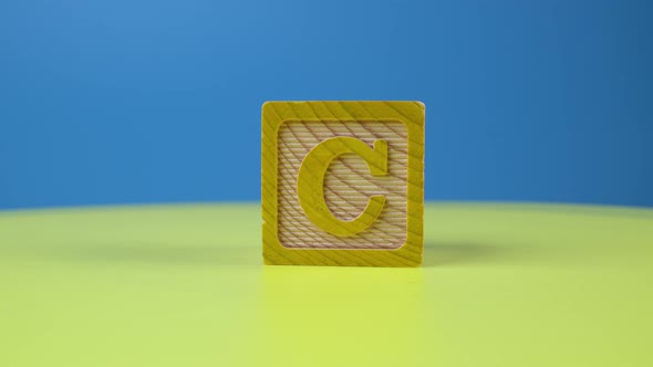 Close up shot letter "C" alphabet wooden block alt