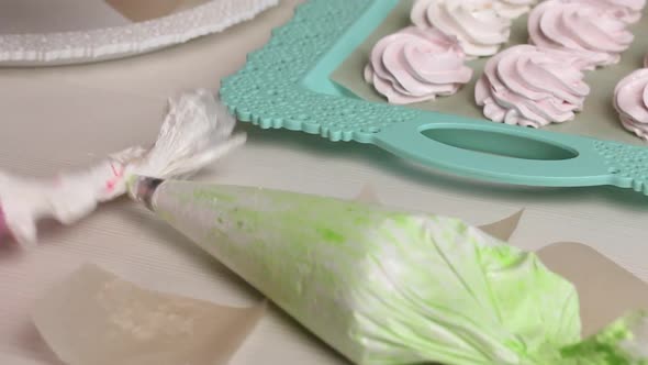 Marshmallow Mass In A Pastry Bag. Marshmallows Are Spread Out On The Table Surface. Close Up Shot. alt