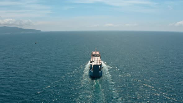 Aerial View of a Dry Bulk Carrier in the Sea alt
