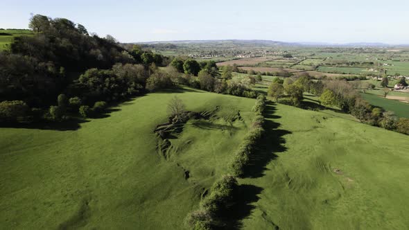 Meon Hill Cotswolds Cinematic Aerial Landscape Landslipe Sheep In Field Spring Season Mickleton