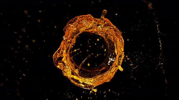 Super Slow Motion Shot of Rotating Oil Whirl Isolated on Black Background at 1000Fps alt