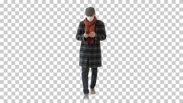 Gentleman in medical mask using phone and walking, Alpha Channel alt
