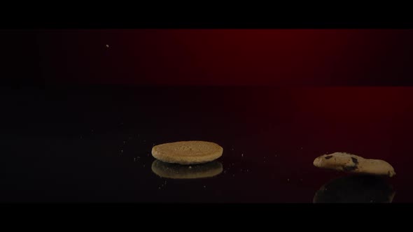 Falling cookies from above onto a reflective surface - COOKIES 237 alt