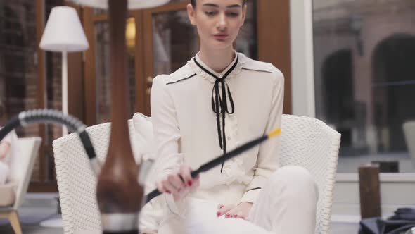 Fruit Hookah. Atractive Woman Smoking Shisha At Bar alt