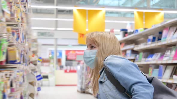 Woman in Mask at Supermarket alt