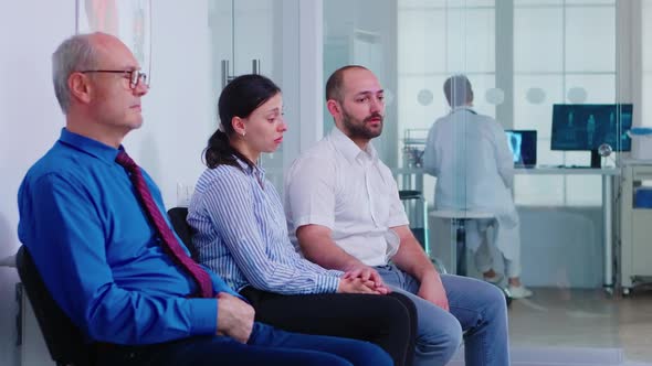 Married Couple Crying After Receiving Bad News From Doctor on Virus Test Results alt