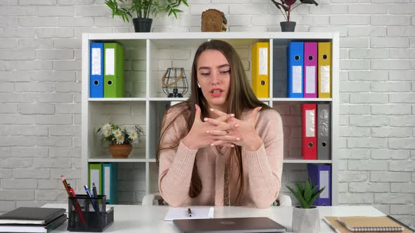 Thoughtful woman tutor speak student on remote online video call chat conference alt