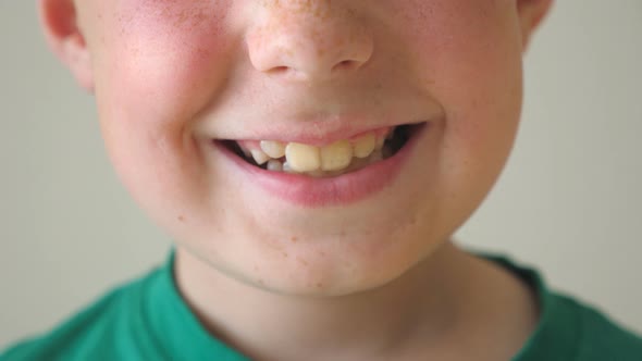 Close Up of Young Child Mouth Smiling and Laughing Indoor