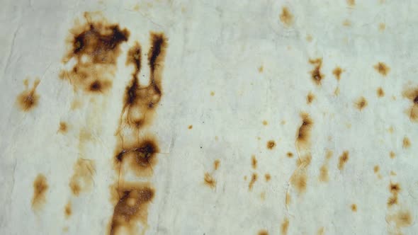 Background in the Form of Fried Pita Bread Spinning Texture of Fresh Baked Goods alt