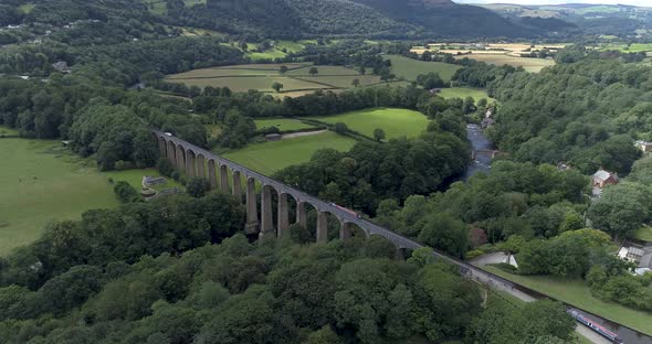 Right to left aerial orbital of Llanollen aqueduct in the Vale of Llangollen, East Wales alt