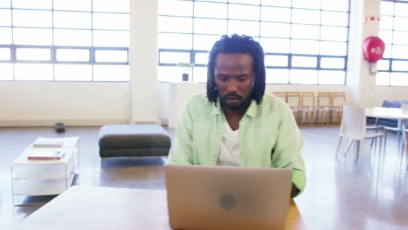 Colleagues whispering to each other alt