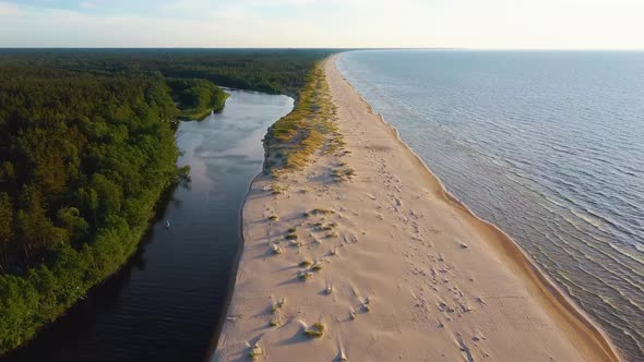 Irbe River Meets Baltic Sea in Latvia Aerial Dron 4K Shot. alt