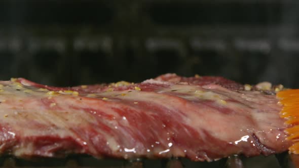 Raw Skirt Steak Seasoned On The Grill 53