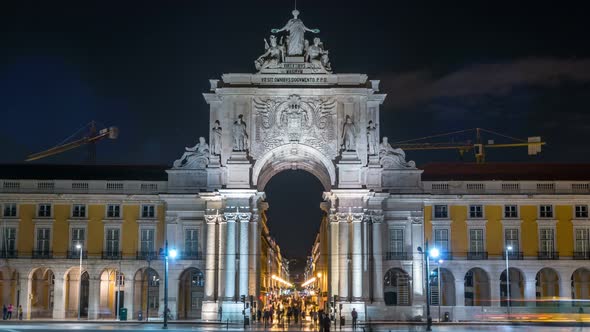 Triumphal Arch at Rua Augusta at Commerce Square Night Timelapse in Lisbon, Portugal. alt