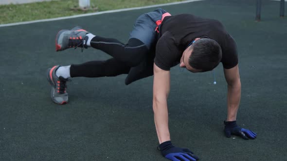 Man training outdoors on sports field