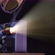 Movie Projector with Film Reel Plays the Old Retro Video on