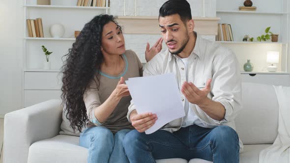 Stressed Spaniard Hispanic Couple Receives Letter Notice of Divorce Papers Documents Feels Shocked alt