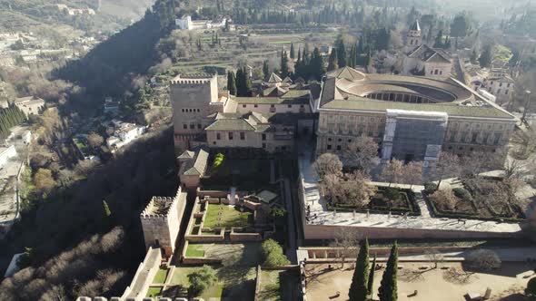 The Alhambra Palace, Flying backwards revealing fortress towers, Granada. Spain